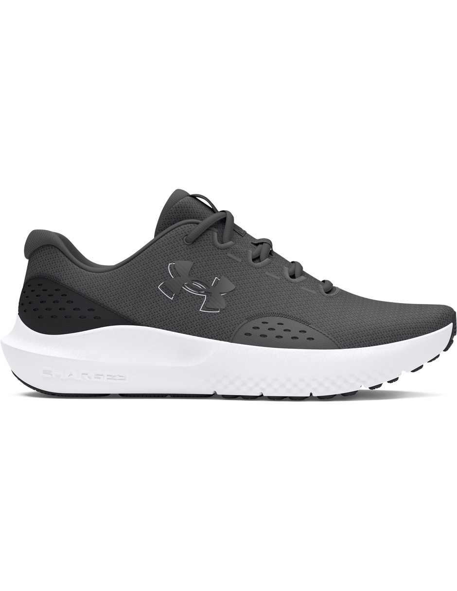Tenis UA Charged Surge 4GRY para correr de hombre